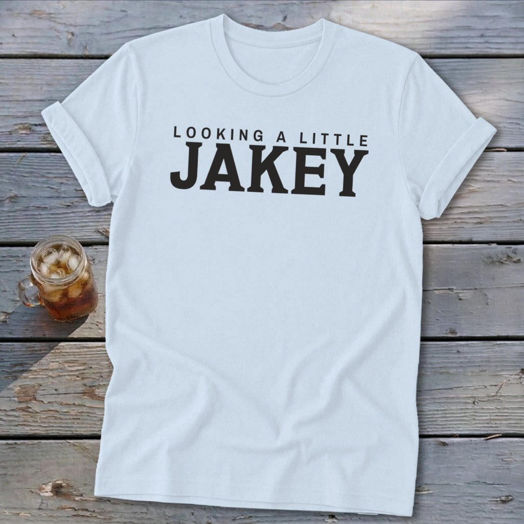 Light blue t-shirt with black text "LOOKING A LITTLE JAKEY".