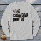 White long-sleeve shirt with "GONE CRAWDAD HUNTIN'" text.