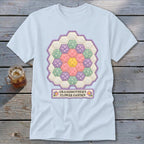 Light blue t-shirt with a hexagon quilt design and "Grandmother's Flower Garden" text.