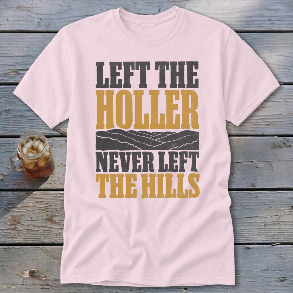 Pink t-shirt with text: "Left the Holler Never Left the Hills"
