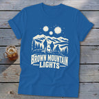 Royal blue t-shirt featuring a mountain graphic with three figures and text reading Brown Mountain Lights.