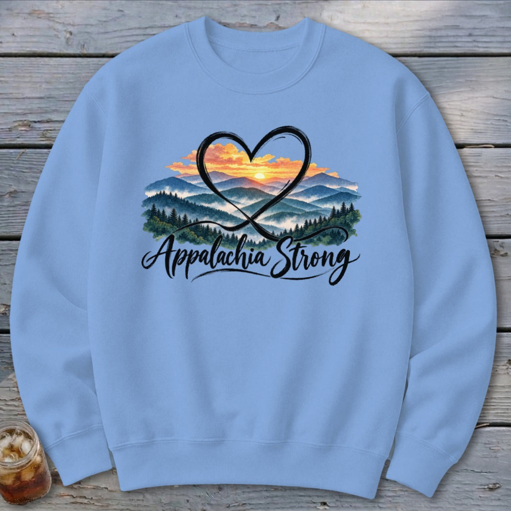 Light blue crewneck sweatshirt with mountain sunset graphic and "Appalachia Strong" text.