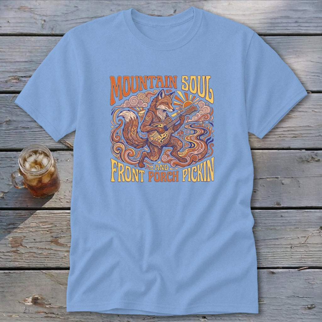 Light blue t-shirt with a stylized fox playing a banjo, surrounded by "Mountain Soul and Front Porch Pickin'".