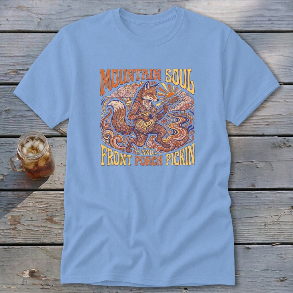 Light blue t-shirt with a stylized fox playing a banjo, surrounded by "Mountain Soul and Front Porch Pickin'".