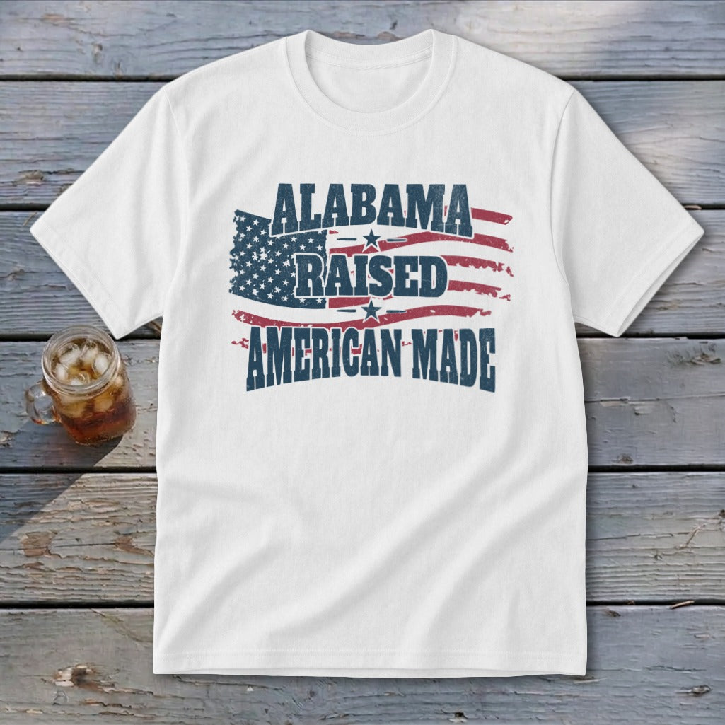 White t-shirt with distressed American flag and "Alabama Raised American Made" text.