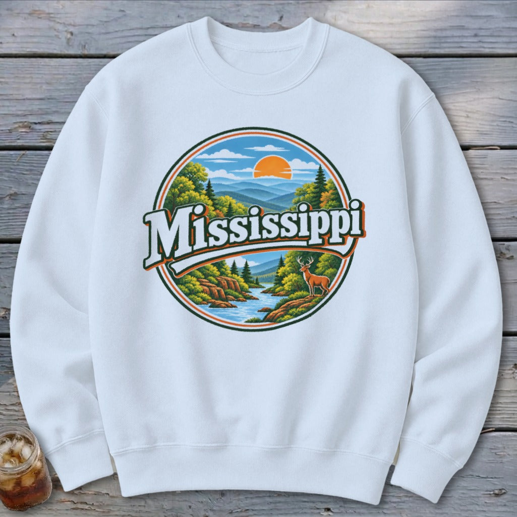White sweatshirt with a circular graphic of a scenic Mississippi landscape and a deer.