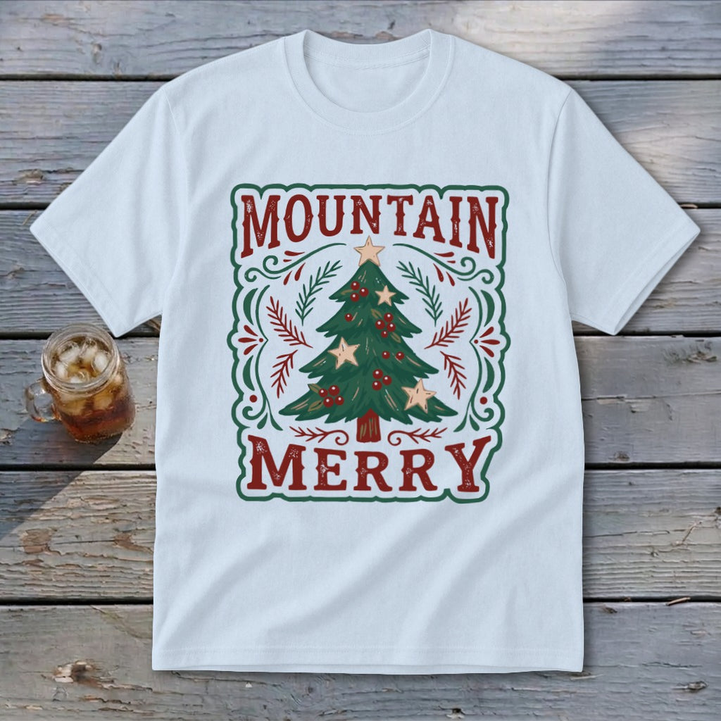 Light blue t-shirt featuring a vintage Christmas tree graphic with red and green text reading Mountain Merry.