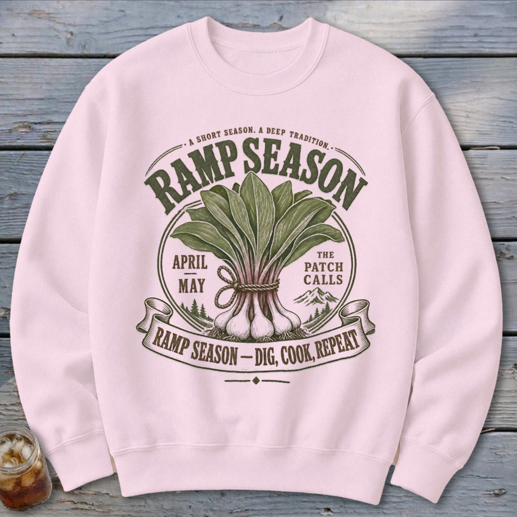 Pink sweatshirt with a graphic that says "Ramp Season" with illustrations of ramps.