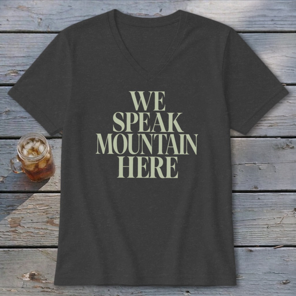 Dark grey v-neck t-shirt with "WE SPEAK MOUNTAIN HERE" text.