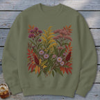 Olive green sweatshirt with a colorful floral and leaf print.