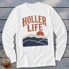 White long-sleeve t-shirt featuring the text HOLLER LIFE above a graphic of mountains and a sun.