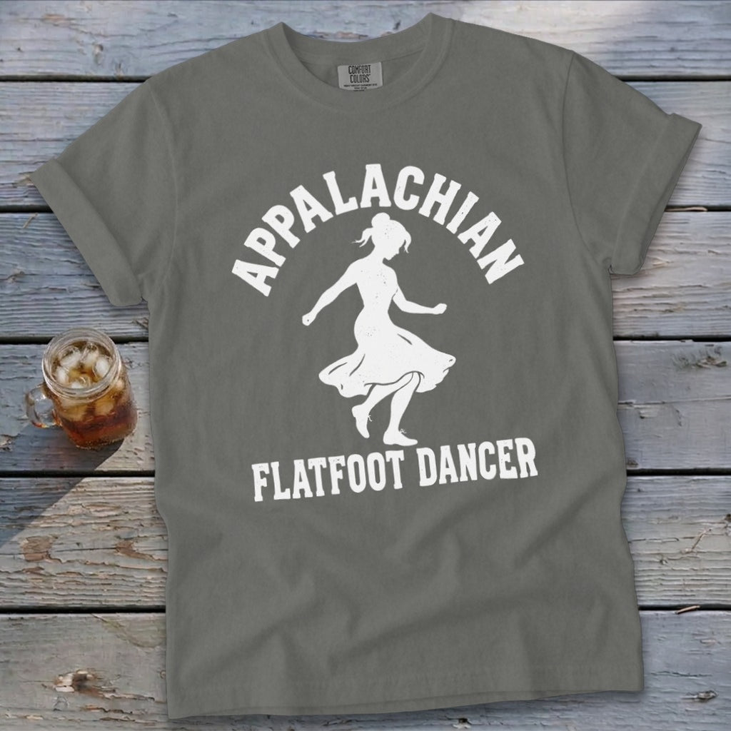 A grey t-shirt featuring a white silhouette of a dancer and the text Appalachian Flatfoot Dancer.