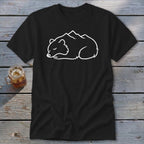 Black t-shirt with a sleeping bear outline with mountains on its back.