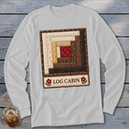 White long-sleeve shirt with a square quilt-style log cabin design and "LOG CABIN" text.