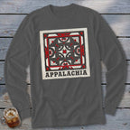 A dark gray long-sleeve t-shirt features a square geometric quilt block graphic with the word APPALACHIA below it.