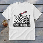 White t-shirt with graphic of axe and firewood with text "Stacked for the Season".