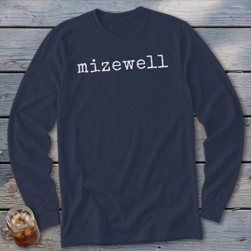 Navy long sleeve shirt with "mizewell" in white typewriter font.