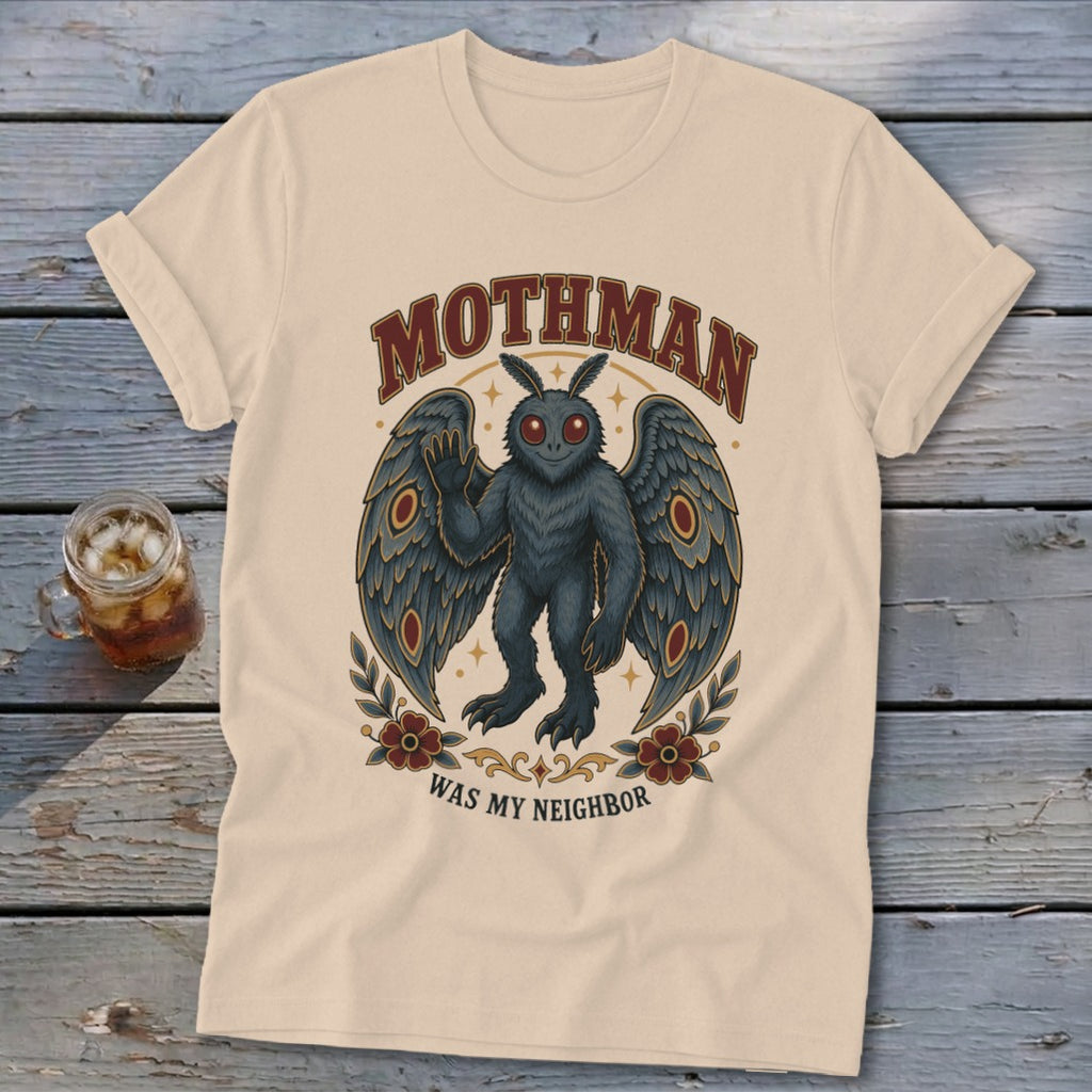 Cream t-shirt with Mothman graphic and text "Mothman Was My Neighbor."