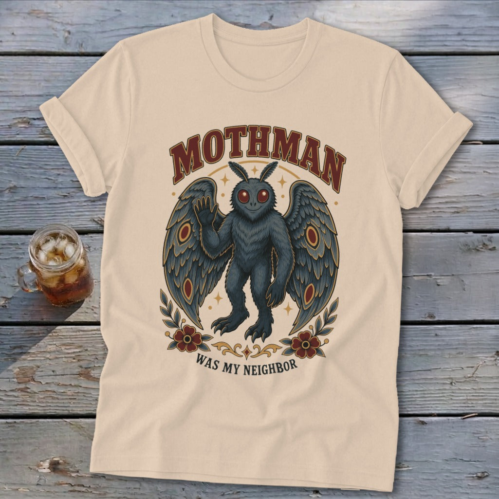 Cream t-shirt with Mothman graphic and text "Mothman Was My Neighbor."