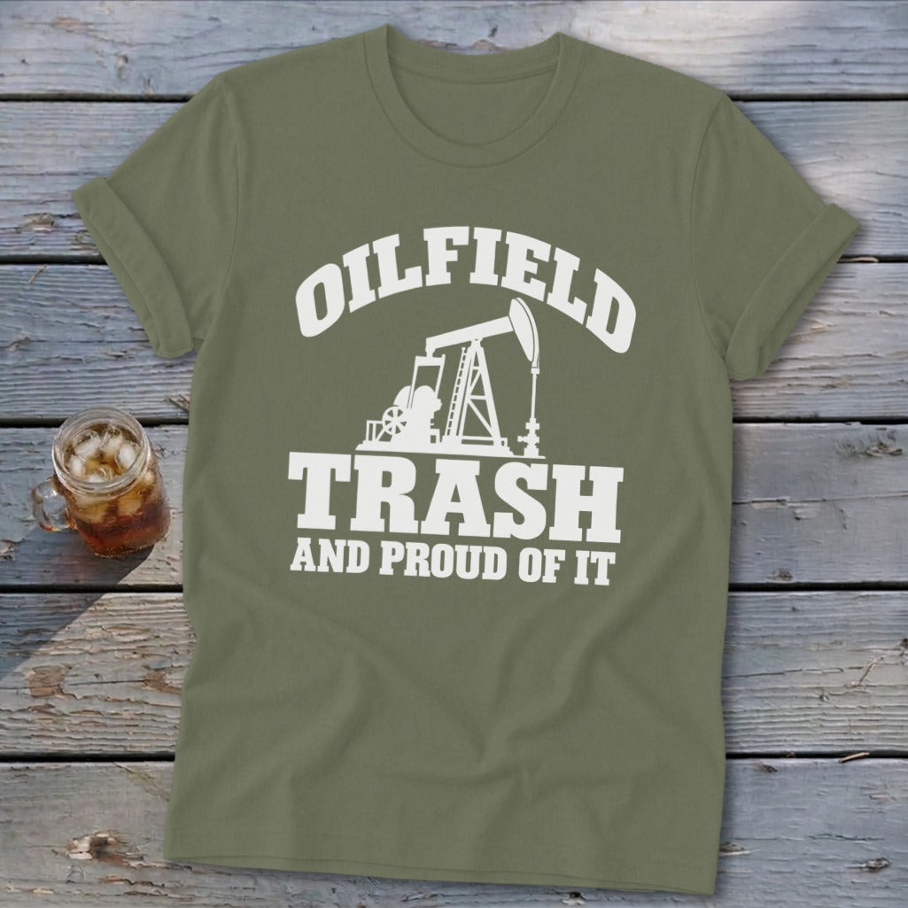 Olive green t-shirt with "OILFIELD TRASH AND PROUD OF IT" and oil pump graphic.