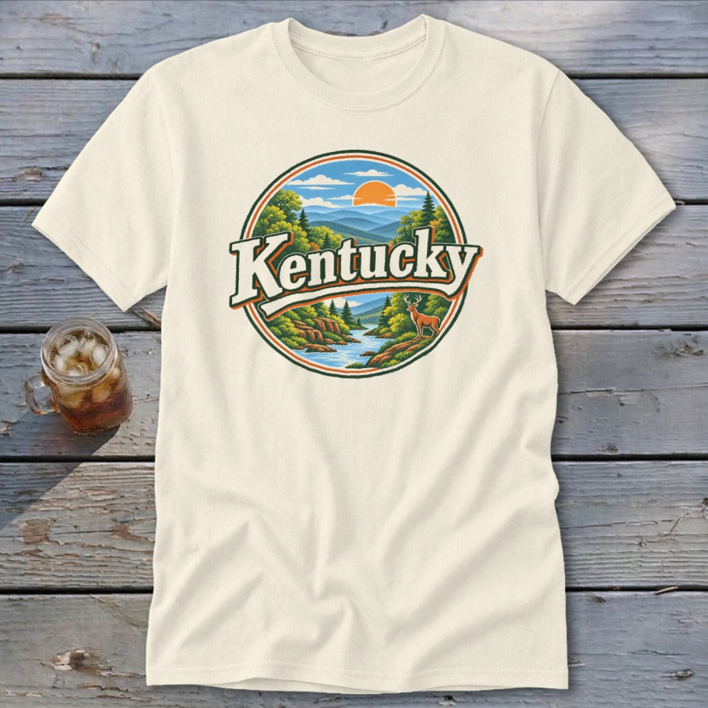 Cream t-shirt with circular graphic of Kentucky landscape featuring deer, river, and mountains.