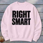 Pink crewneck sweatshirt with "RIGHT SMART" printed in black text.
