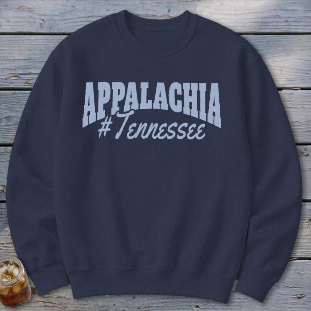 Navy sweatshirt with "APPALACHIA #Tennessee" text in light blue.