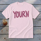 Light pink t-shirt with "YOUR'N" text and a glass of iced tea.