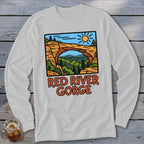 Long sleeve shirt with Red River Gorge arch landscape graphic.