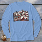 Light blue long-sleeve t-shirt featuring a red, black, and white mountain and quilt graphic centered on the chest.