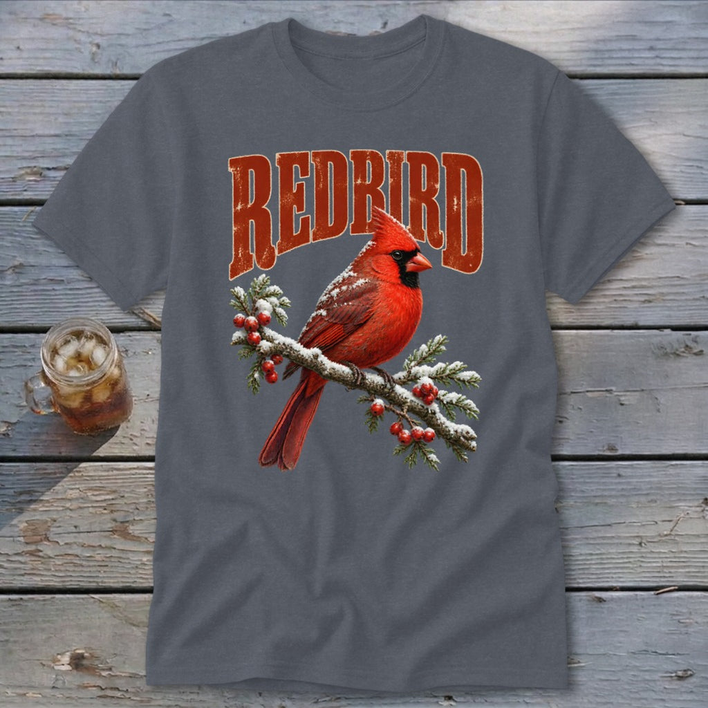 A dark gray t-shirt with a graphic of a red cardinal on a snowy branch beneath the text "REDBIRD".
