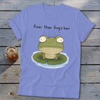 Periwinkle t-shirt featuring a cartoon frog on a lily pad with the text finer than frog's hair.