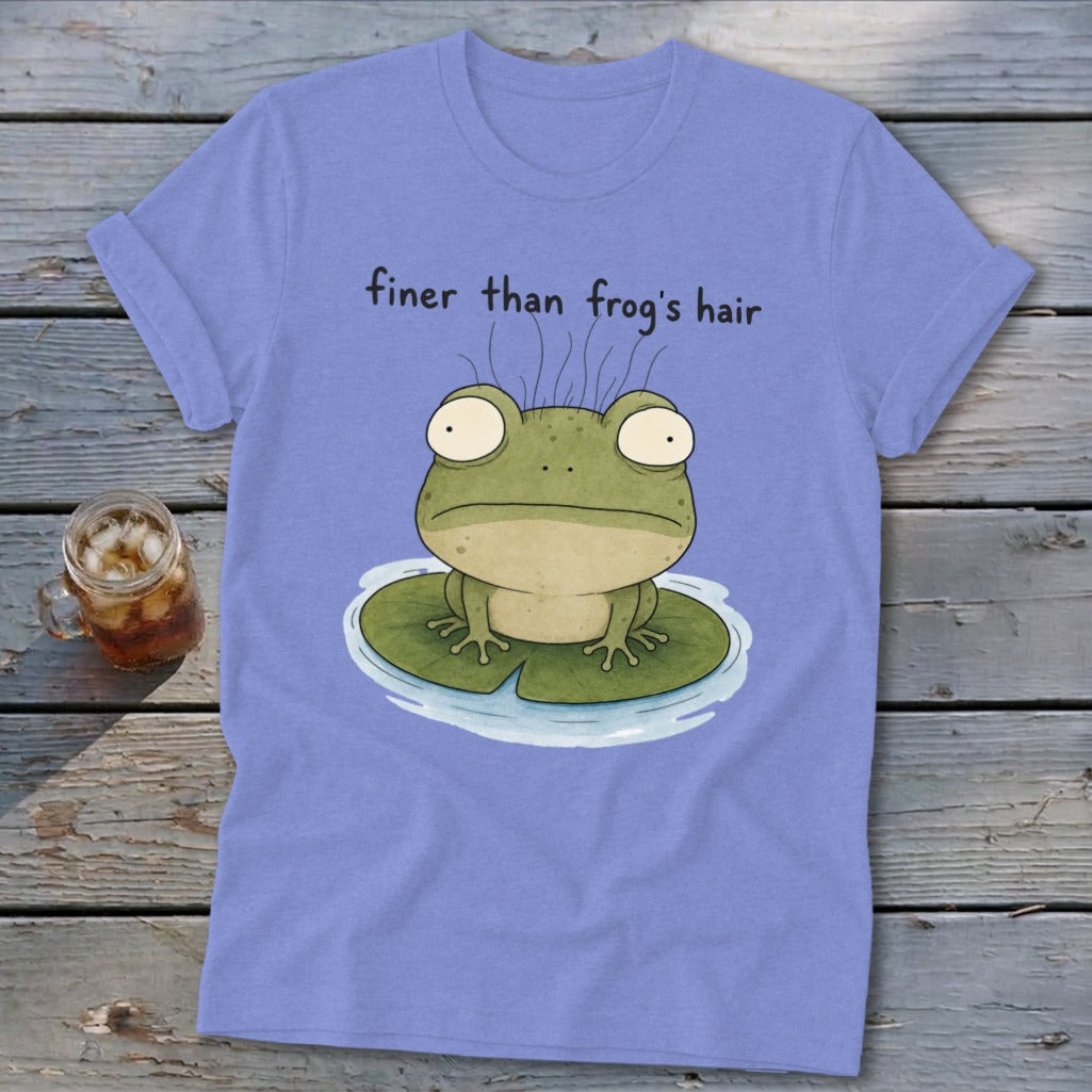 Periwinkle t-shirt featuring a cartoon frog on a lily pad with the text finer than frog's hair.