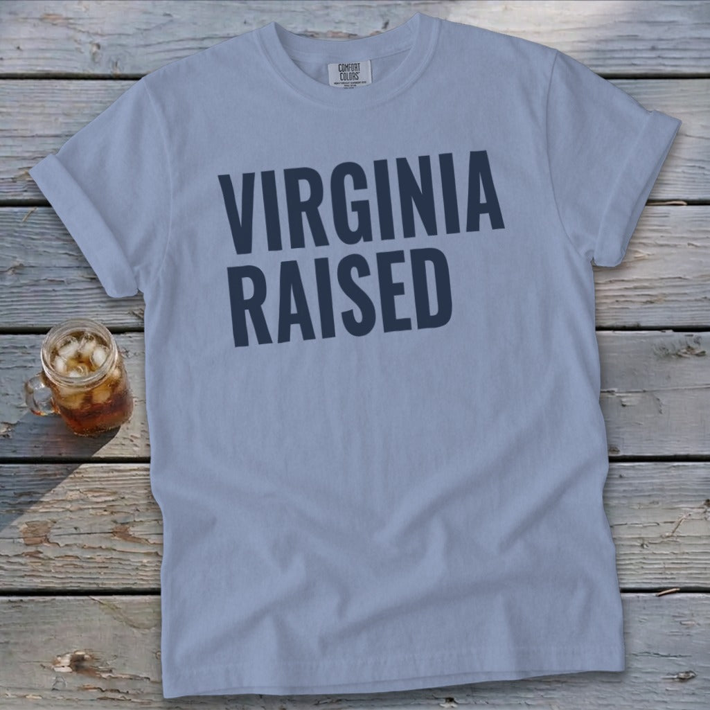 Light blue t-shirt with "Virginia Raised" in dark blue text.