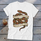 White t-shirt with coiled snake graphic and banner text "Respect the Mountains Watch Your Step".