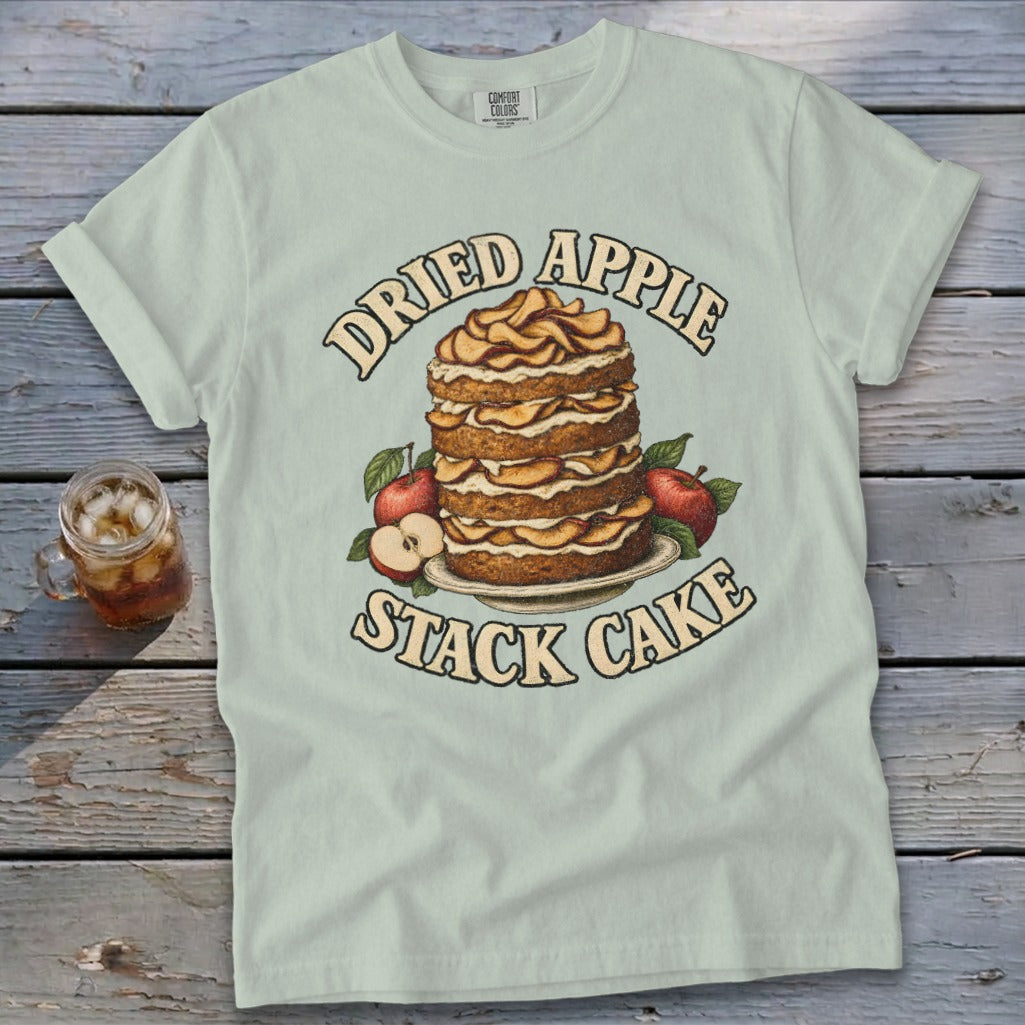 Light blue t-shirt graphic with "Dried Apple Stack Cake" and layered cake with apples.
