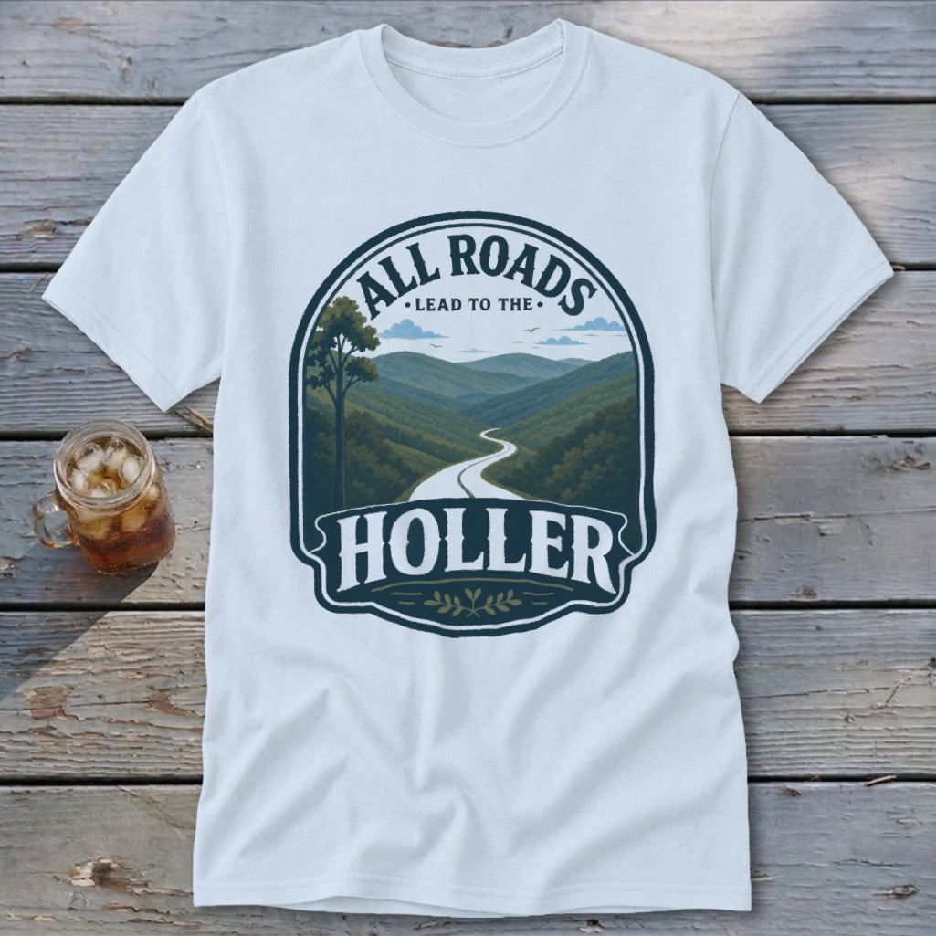 Light blue t-shirt with a graphic featuring a winding road through mountains and text "All Roads Lead to the Holler."