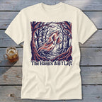 Cream t-shirt with ghost in spooky forest graphic and text "The Haints Ain't Left".