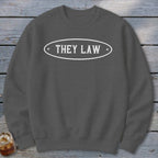 Dark gray sweatshirt with white oval text that reads "THEY LAW".