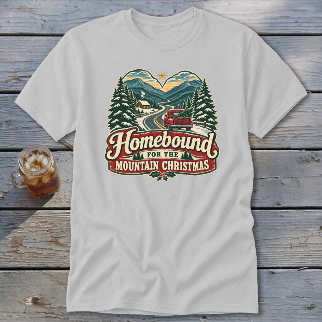 Homebound for the Mountain Christmas graphic on a light gray t-shirt.