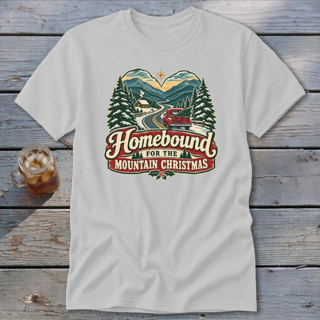 Homebound for the Mountain Christmas graphic on a light gray t-shirt.