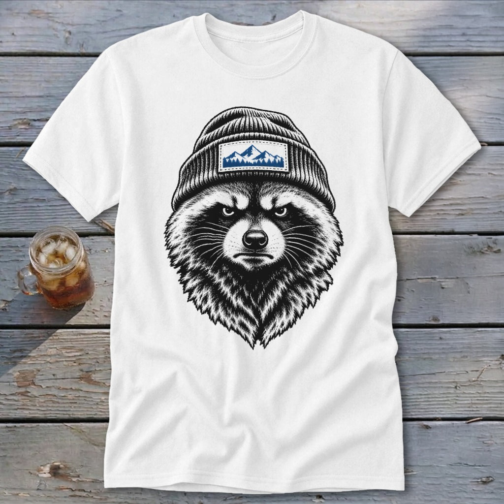 White t-shirt with a sketch of a raccoon wearing a beanie with a mountain patch.