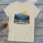 Cream t-shirt with mountain sunset graphic and text "Ridge Runner Morning".