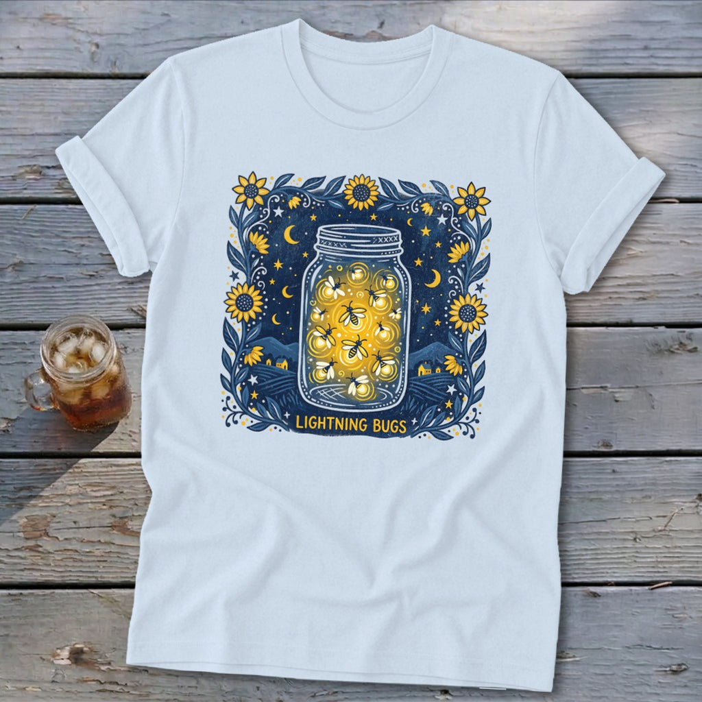 Light blue t-shirt with a "Lightning Bugs" graphic of fireflies in a jar.