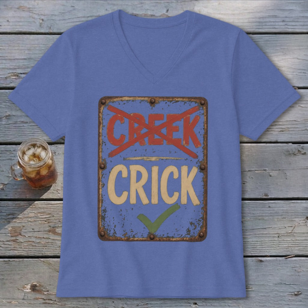 T-shirt with "CREEK" crossed out and "CRICK" with a checkmark on a sign.