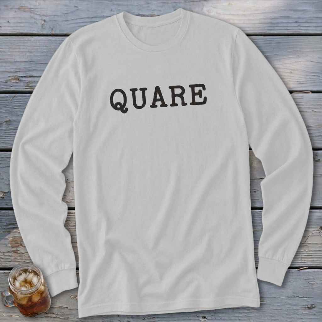 White long-sleeved shirt with "QUARE" printed in black text.