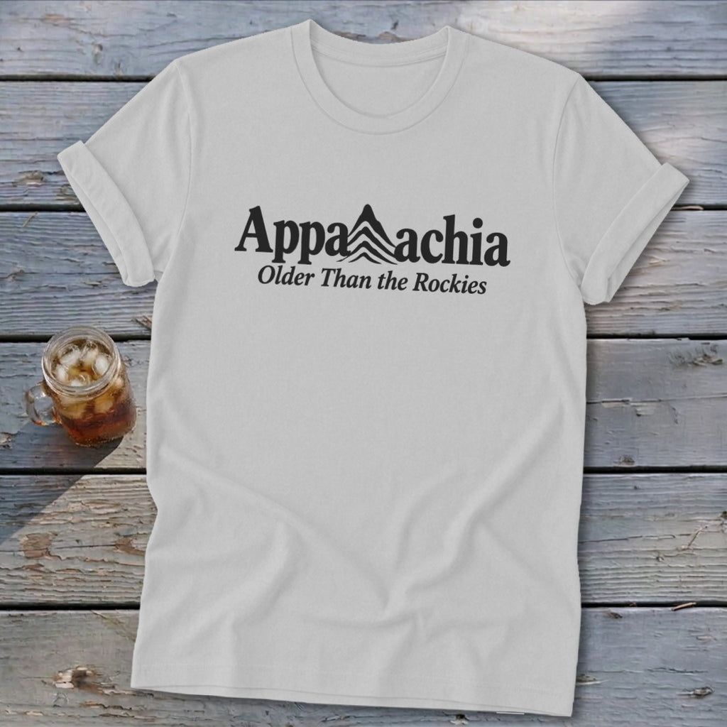 White t-shirt with "Appalachia Older Than the Rockies" text and mountain graphic.