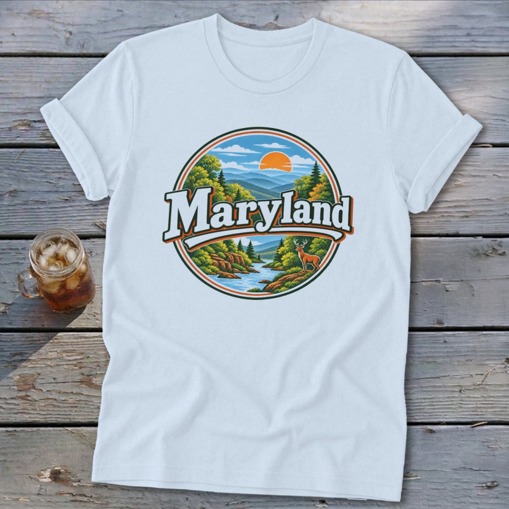 White t-shirt with circular Maryland landscape graphic featuring mountains, trees, river, and deer.