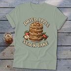 T-shirt with "Dried Apple Stack Cake" text and graphic illustration of a cake.