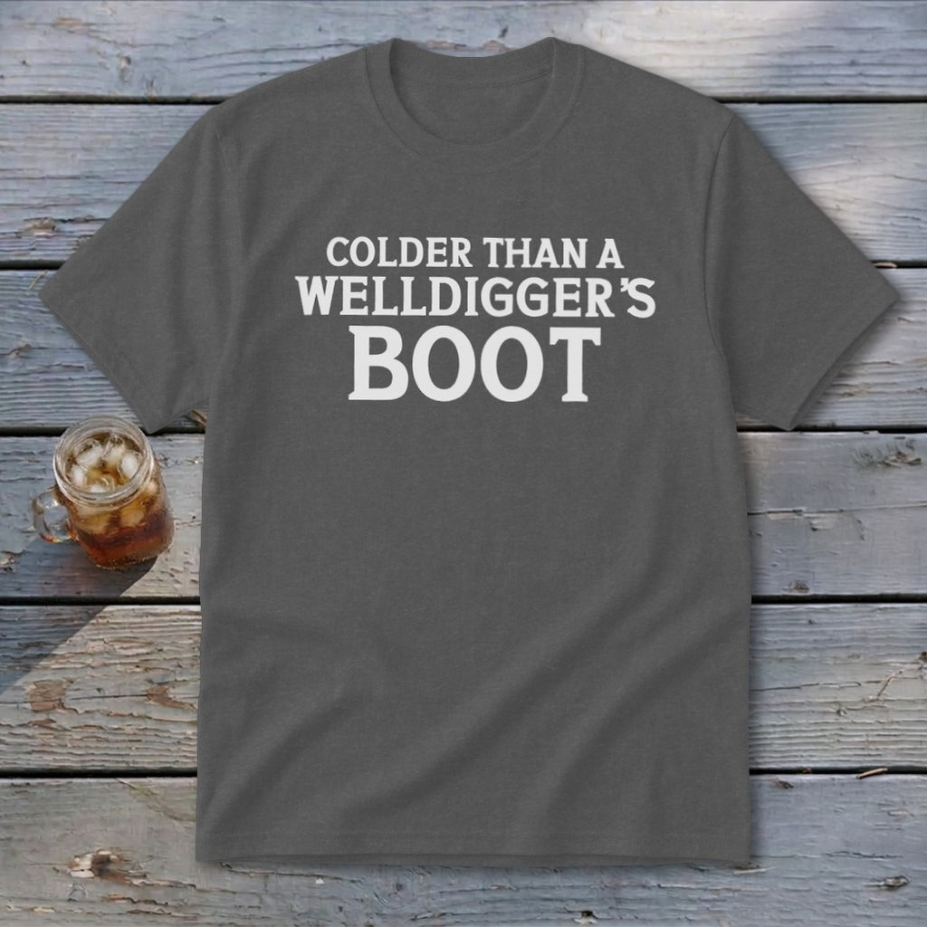 Dark grey t-shirt with white text "Colder Than A Welldigger's Boot".